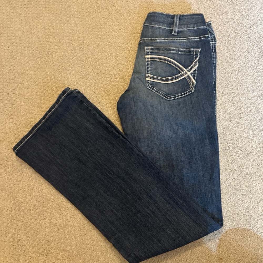 Never worn Ariat Dark Blue Boot Cut Jeans